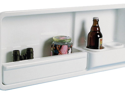 Vano laterale portaoggetti provvisto di due portabicchieri /lattine/ piccole bottiglie